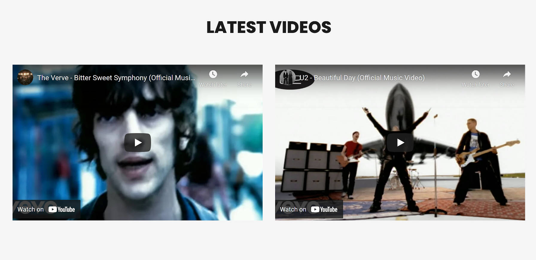 A section with two columns, each with an embedded YouTube video.