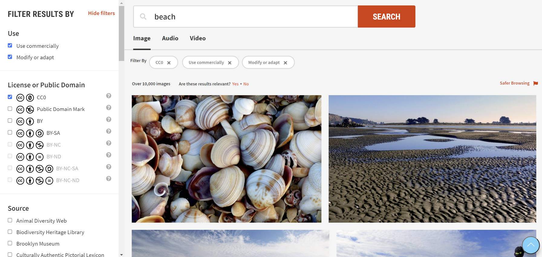 Image search results for beach photos on CC Search.
