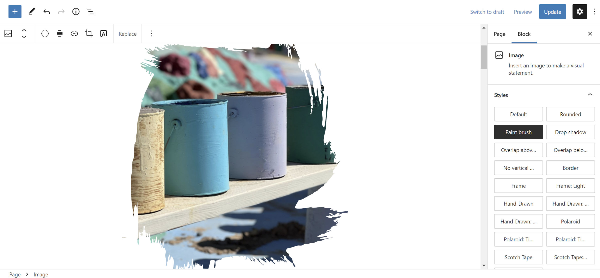 Photo of paint cans with an cutout outline in the shape of brush strokes.